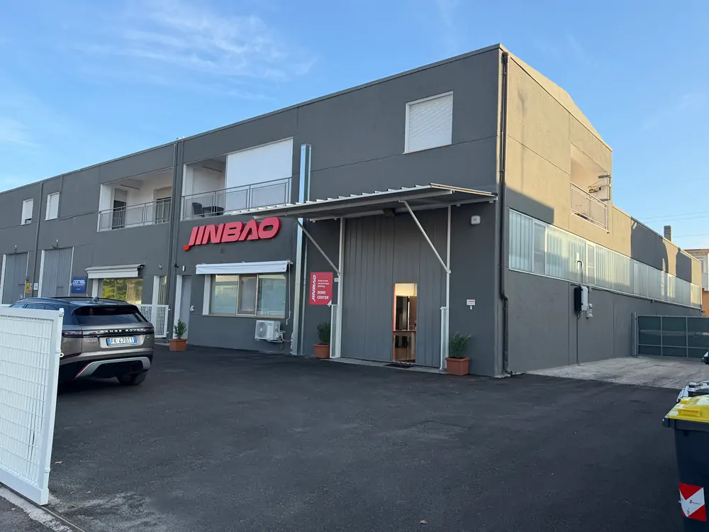 Jinbao Europe demo center building exterior in Pesaro Italy with red sign